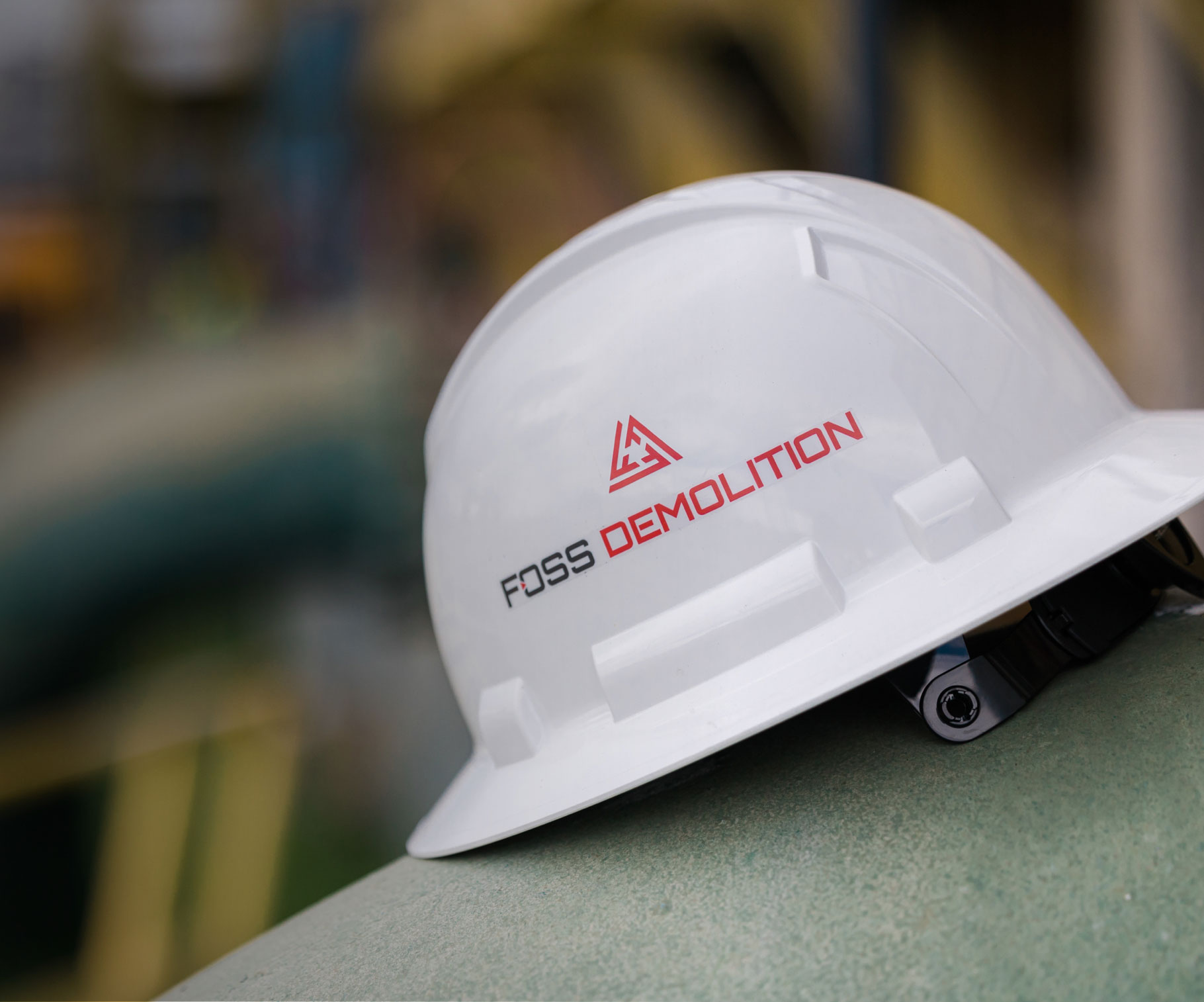 Foss Demolition logo on Hardhat